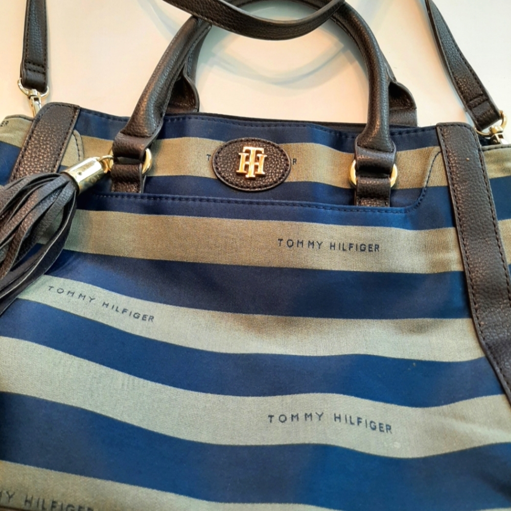 Tommy Hilfiger bag with brown  w leather trim and tassels  blue and gray strips